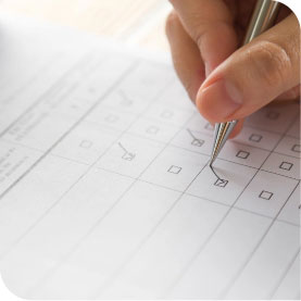 Hi-Fidelity Dental person filling out a form
